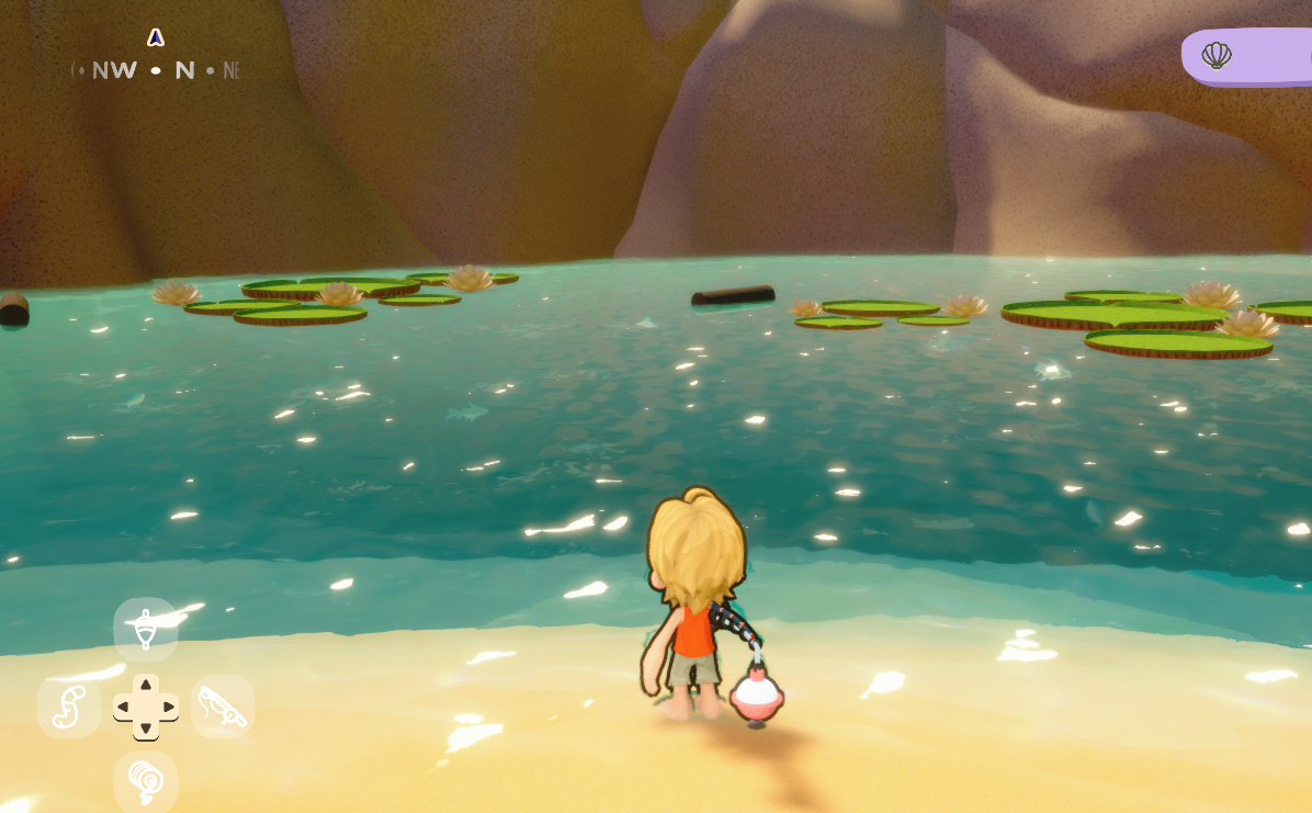 First-person view of the player fishing on the lake, with fish visible beneath the surface